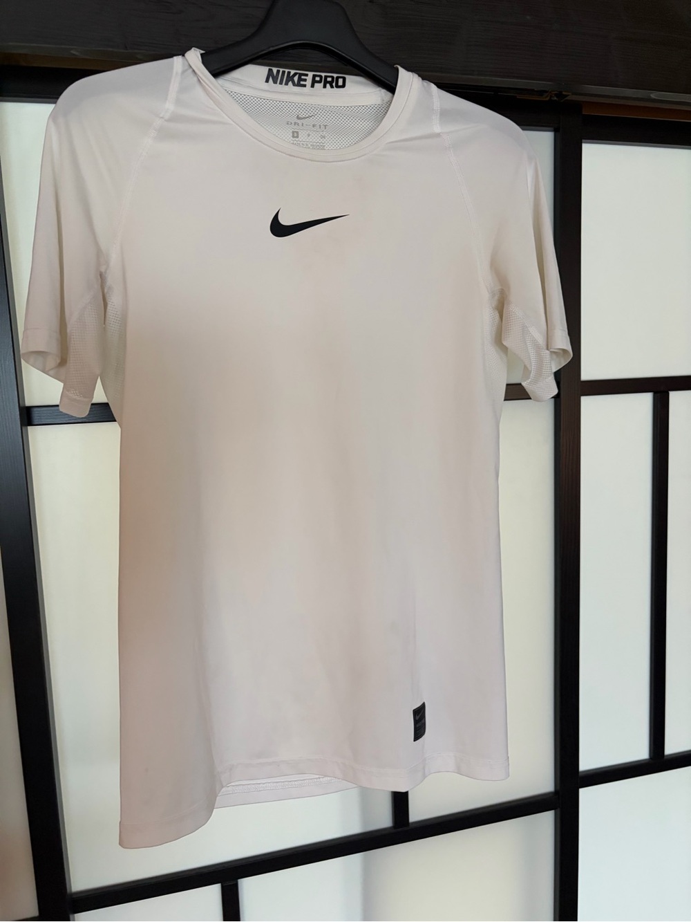Nike White Performance Dri-FIT Training Tee with Black Swoosh